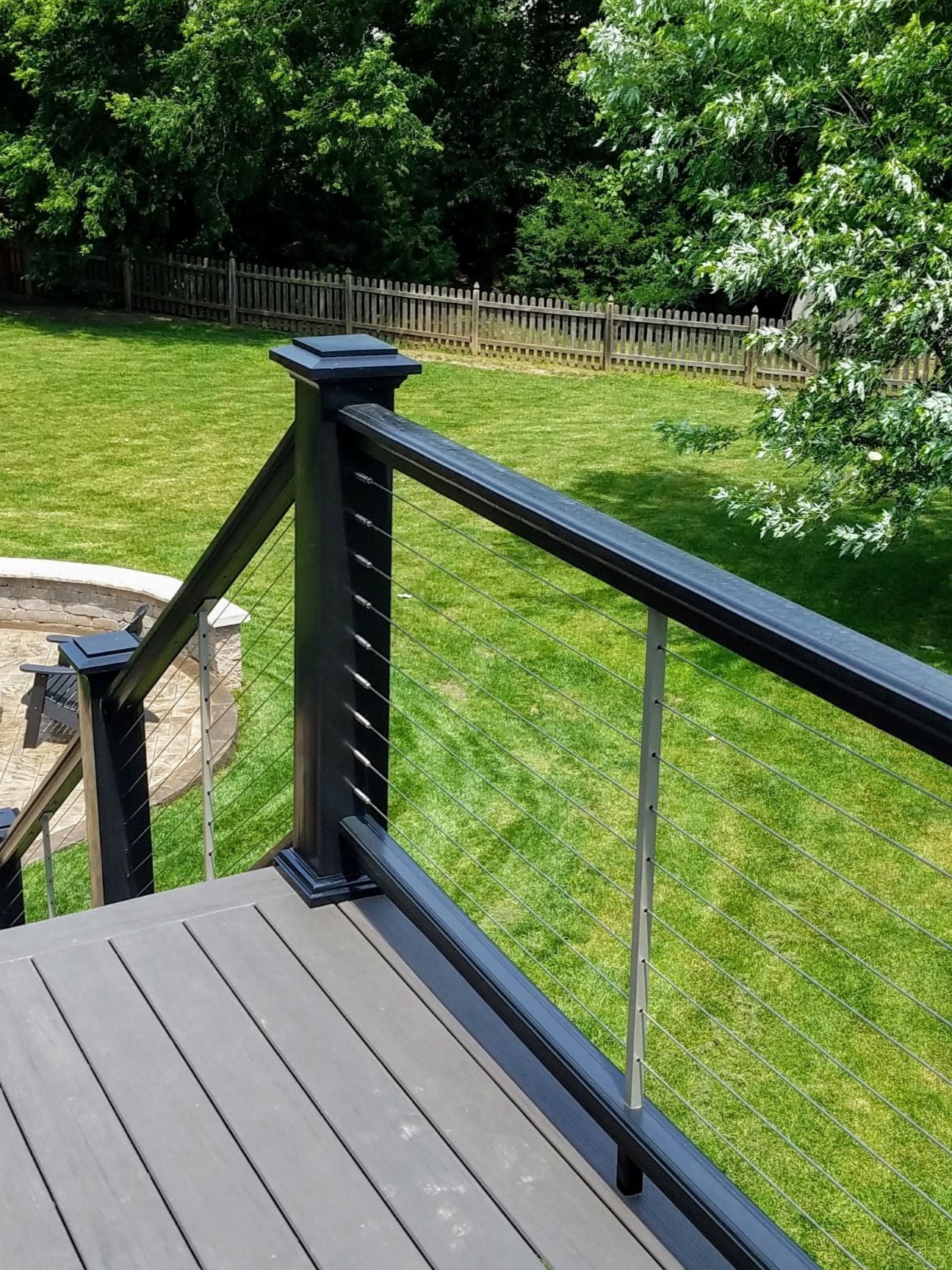 Feeney Lag Connectors and Swivel Lag Turnbuckle Stainless Steel Fittings into Azek Composite Railing Premier Rail in black with lighted island post caps