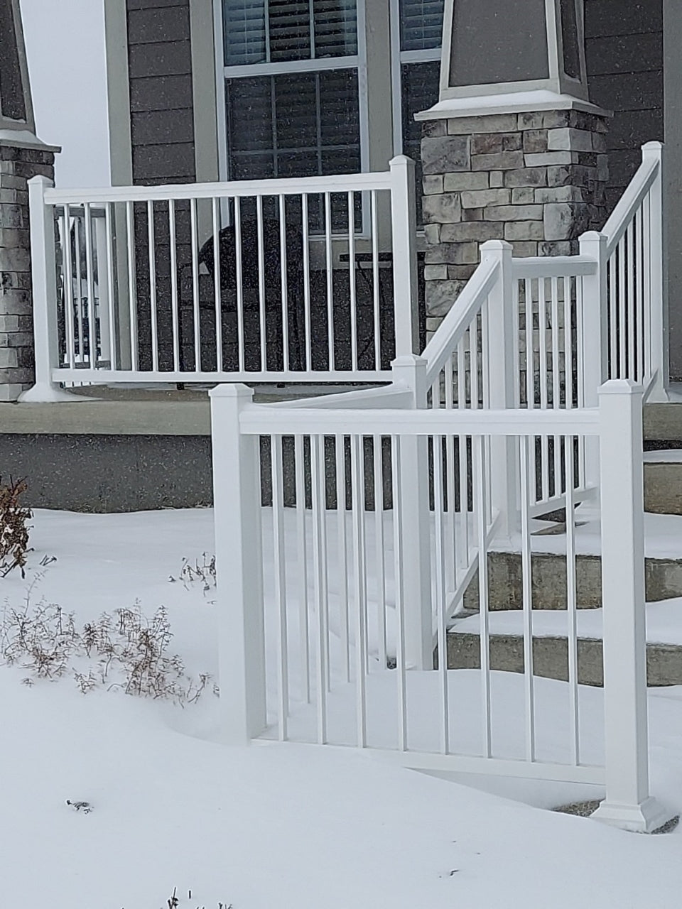 White Railing all aluminum impression rail express guardrail porch railing and looks great with snow on the ground!